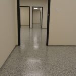 office flooring painted in white and coated with polyaspartic coatings by Hanson paintings service