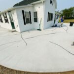 an outside part of the house being prepared to be coated with polyaspartic coatings